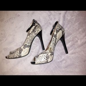 High heeled ankle strap glamor shoes. W size 8.